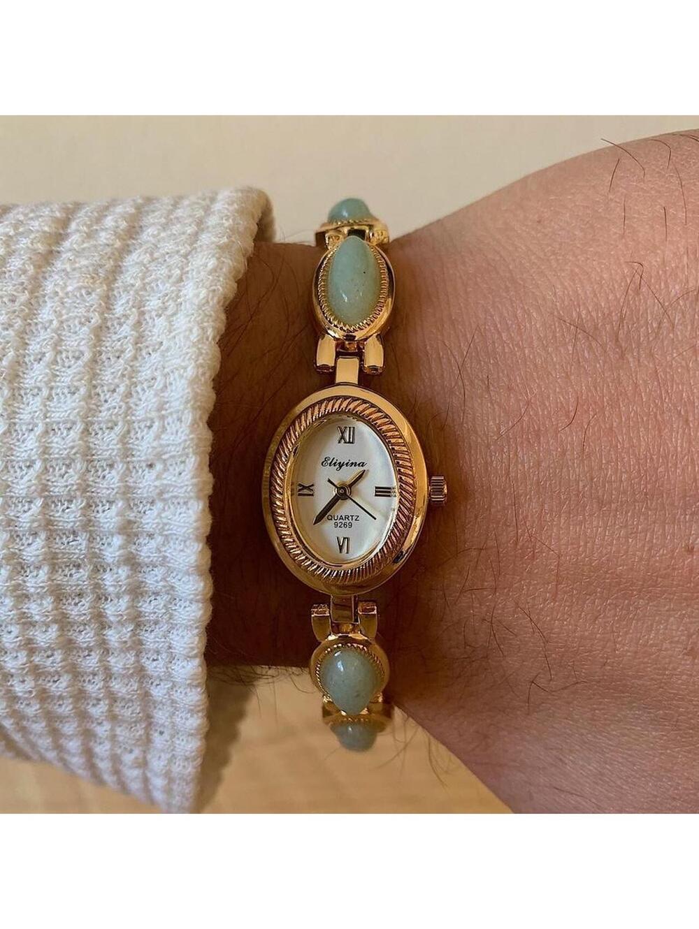 Dainty Gold watch with light blue jade stone opal accents. Item works tell time - Picture 7 of 8